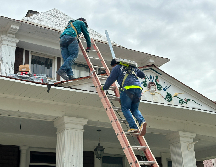 Man descending ladder.