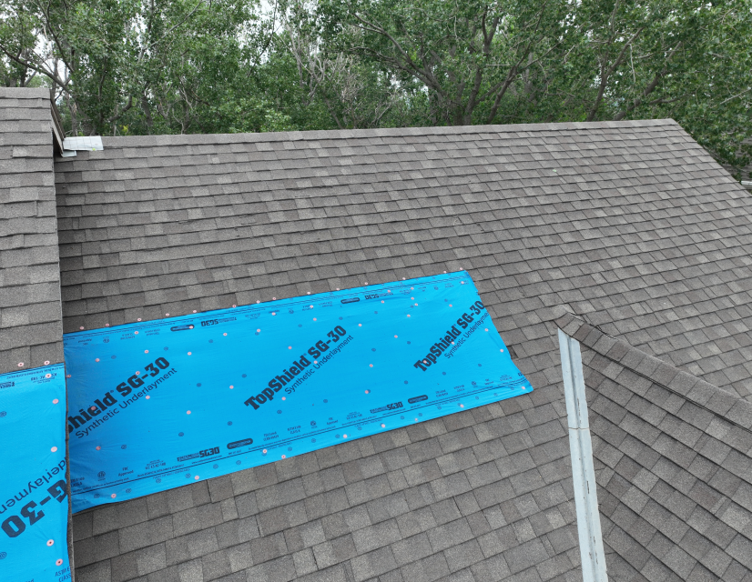 Roof with tarp.